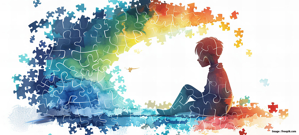 Silhouette colorée d'un enfant assis et des puzzles autour.